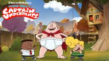 A round, bald man, wearing white underwear and a red cape standing in front of a treehouse beside two small kids laughing.