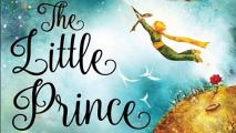 A boy flying though the air in front of a blue sky with a title that reads: The Little Prince.